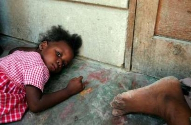 a haitian child takes.jpg (73456 bytes)